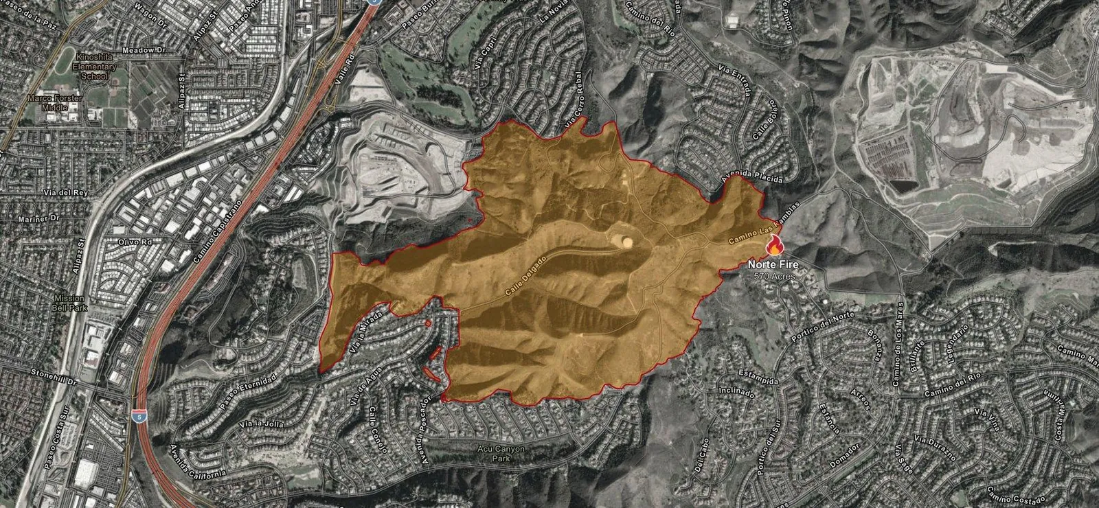 Satellite map of San Juan Capistrano with the Norte Fire's 570-acre burn perimeter shaded in orange.